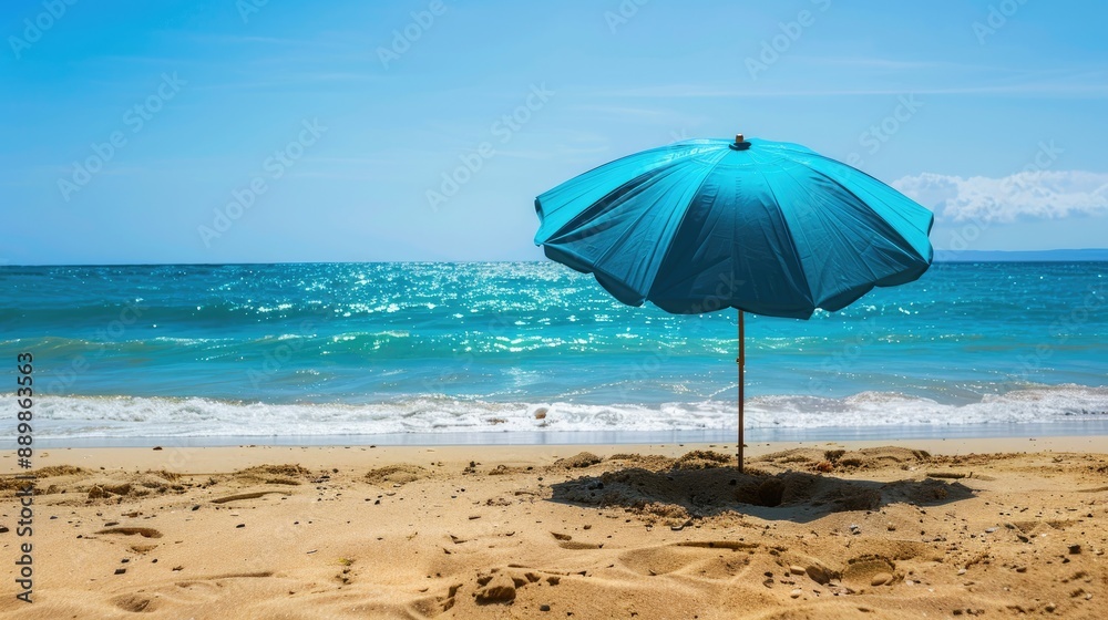 Umbrella on sandy beach with ocean view Umbrella on sandy beach with ocean view