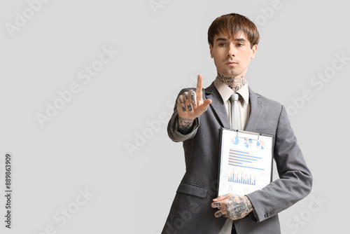 Young businessman with clip...