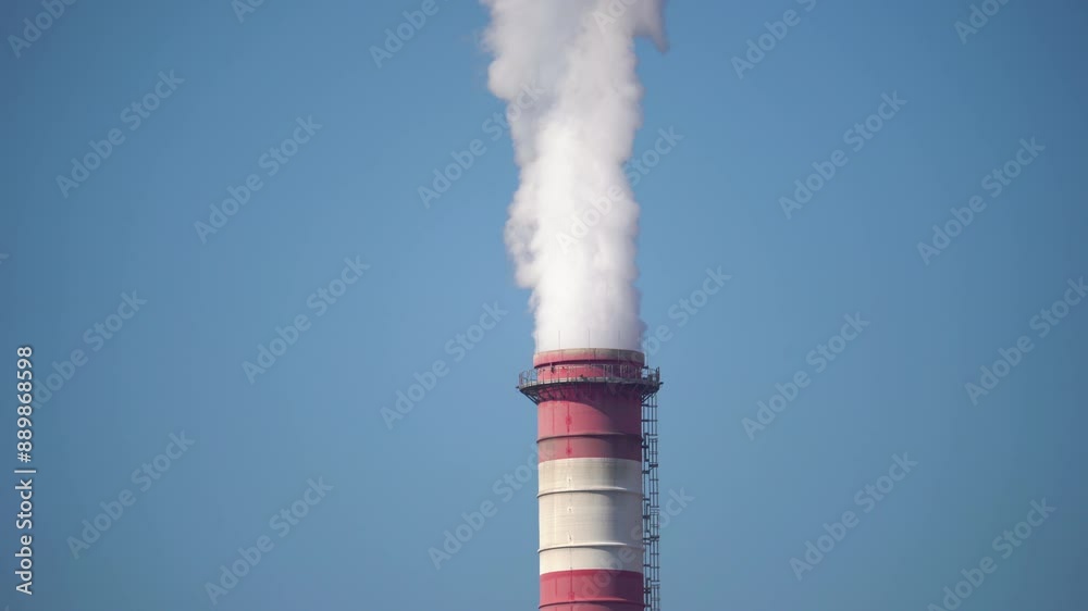 Industrial chimneys smoke stack. Heavy smoke coming out of smoke stack. Problems of environmental pollution from plants and factories. Industrial chimneys smoke stack. Heavy smoke coming out of smoke stack. Problems of environmental pollution from plants and factories.
