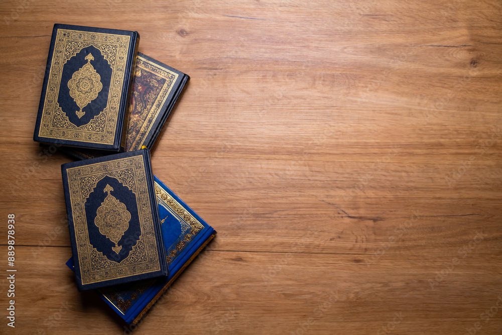 Φωτογραφία Ramadan, Eid mubarak, Islamic concept - The Holy Al Quran with written Arabic calligraphy meaning of Al Quran and rosary beads or tasbih, on wooden table, with copy space