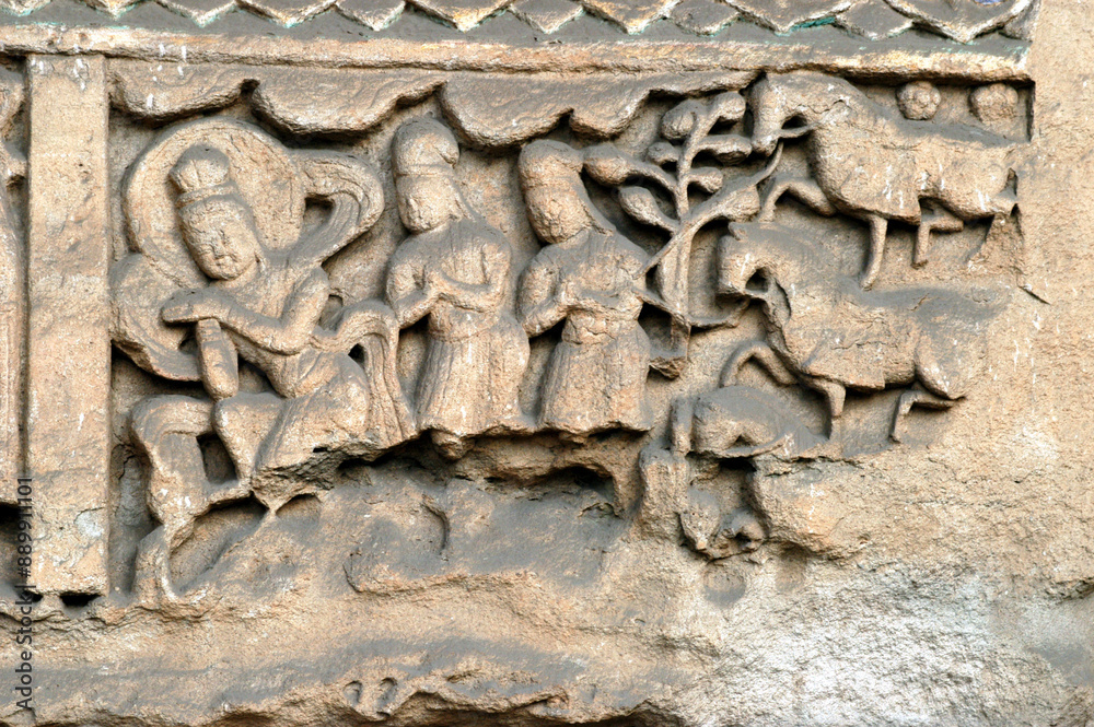 Obraz premium The Yungang Grottoes in Shanxi Province, China, began to be excavated during the Northern Wei Dynasty and lasted about 150 years, with more than 59,000 stone statues. World Cultural Heritage.
