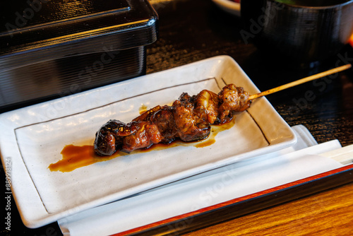 鰻の肝串。
鰻一尾に付き一つだけある、鰻の内臓を使用したおつまみである。
炭火焼うなぎ専門店「うな政」。
革新的な調理システムで非常に廉価に美味しい鰻が食べられる。
日本国静岡県伊豆半島三島市-2024年6月30日

三島市の名物、鰻の蒲焼。
各所から湧き出る、富士山の湧水を利用し、ハイクオリティな鰻を食べることができる。

かつて三島の鰻は、三嶋大社の神使として崇められていた。
 photo