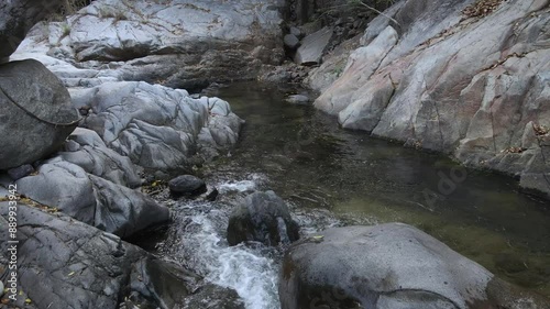 River and rocks, Rocks and water, little waterfalls and huge rocks. Aerial shot flying a River