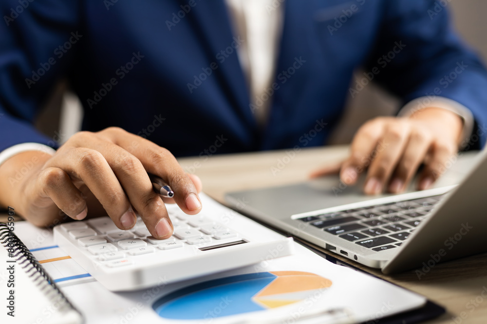 Business strategy analysis by executive measuring success and improving performance.Company performance for financial goals success. Businessman calculates financial data for long term investment. Business strategy analysis by executive measuring success and improving performance.Company performance for financial goals success. Businessman calculates financial data for long term investment.