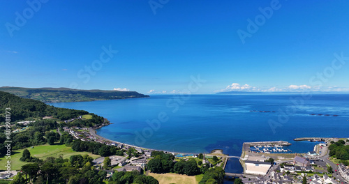 Aerial view of Glenarm Bay on the Irish Sea Antrim Northern Ireland on a sunny day with a blue sky photo