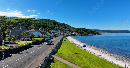 Aerial view of Glenarm Bay on the Irish Sea Antrim Northern Ireland on a sunny day with a blue sky