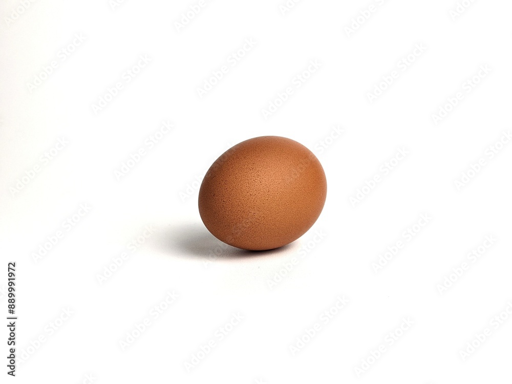 Brown chicken eggs isolated against white background