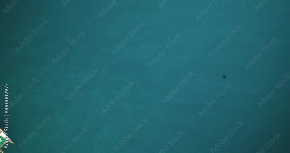 High shot flying over beautiful boat in ocean High shot flying over beautiful boat in ocean