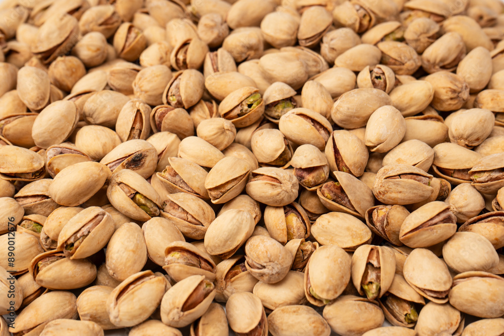 Tasty pistachios isolated on a white background. Tasty pistachios isolated on a white background.