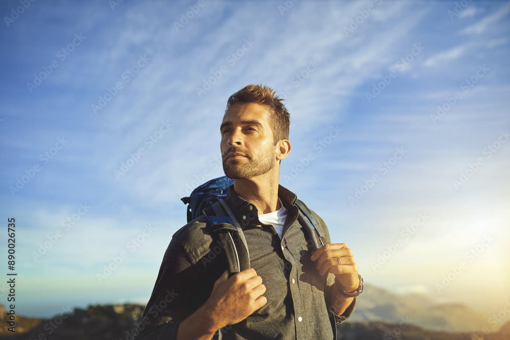 Thinking, hiking and man on mountain with cloudy sky, achievement and sunset on holiday adventure. Nature, inspiration and hiker on cliff with backpack, calm scenery and outdoor vacation in France Thinking, hiking and man on mountain with cloudy sky, achievement and sunset on holiday adventure. Nature, inspiration and hiker on cliff with backpack, calm scenery and outdoor vacation in France