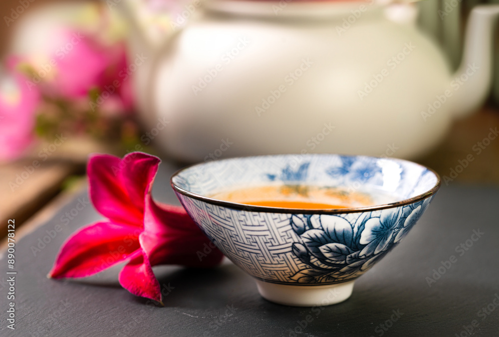 Chinese teapot and teacups with tea