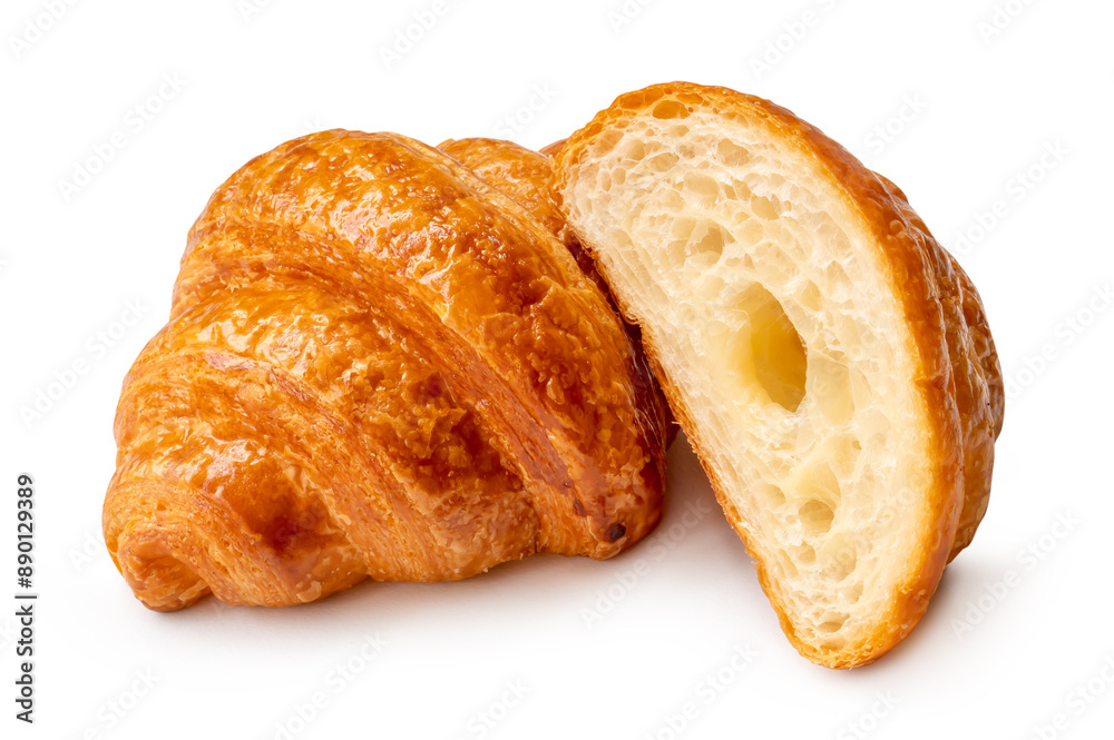 Single brown croissant with half in stack isolated on white background with clipping path Single brown croissant with half in stack isolated on white background with clipping path
