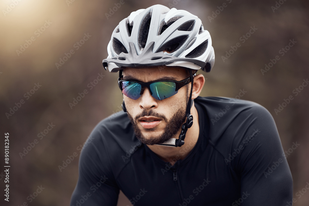 Man, cyclist and racing with helmet, sunglasses and cycling for sport, exercise and adventure. Male person, fitness and safety as athlete for training, physical activity and wellness on mountain road Man, cyclist and racing with helmet, sunglasses and cycling for sport, exercise and adventure. Male person, fitness and safety as athlete for training, physical activity and wellness on mountain road