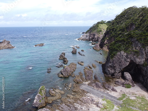 The northern corner of Shikinejima Island in Tokyo JAPAN is home to the stunning Tomari Beach. photo