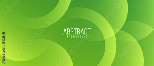 Abstract background of dynamic overlapping green circles in gradient design