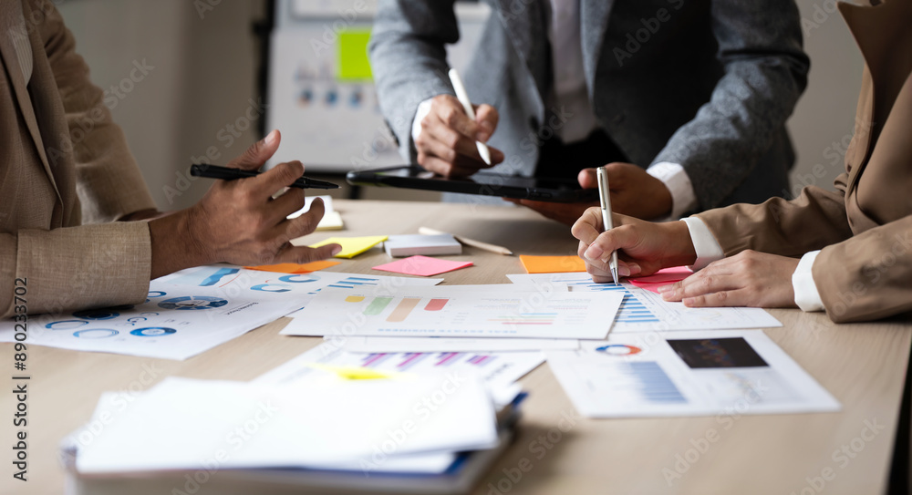 Business people startup company meeting together to summarize and plan investment finances Business people startup company meeting together to summarize and plan investment finances