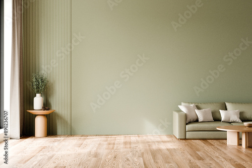 Minimalist living room featuring a soft green accent wall, light wood flooring, a simple beige sofa with cushions, a wooden table, and a potted plant by a window. 3d render.