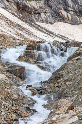 Gletscherbach mit Wasserfall am Steingletscher, Berner Oberland, Schweiz photo