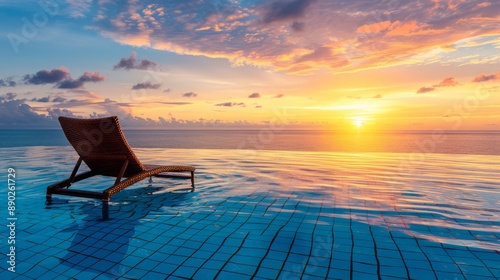 luxury swimming pool on sea view and chair in hotel resort with sunrise time 