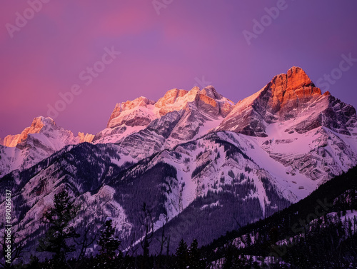 Snow-capped mountains with a pink and purple sunset sky. Generative AI