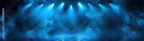 Dramatic blue stage lit by spotlights with atmospheric haze and smoke, perfect for theatrical or concert background.