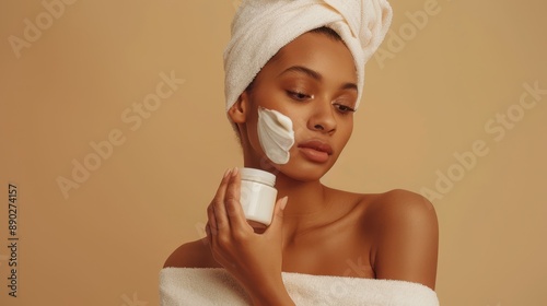 The woman with facial cream photo