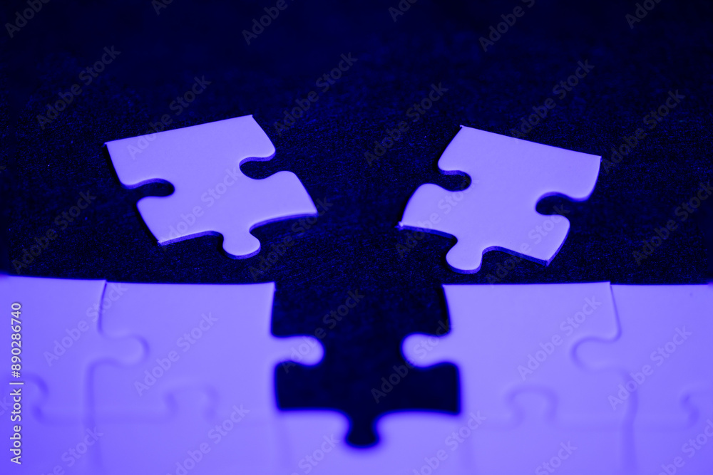 Fototapeta premium Purple puzzle to choose which piece fits in the hole