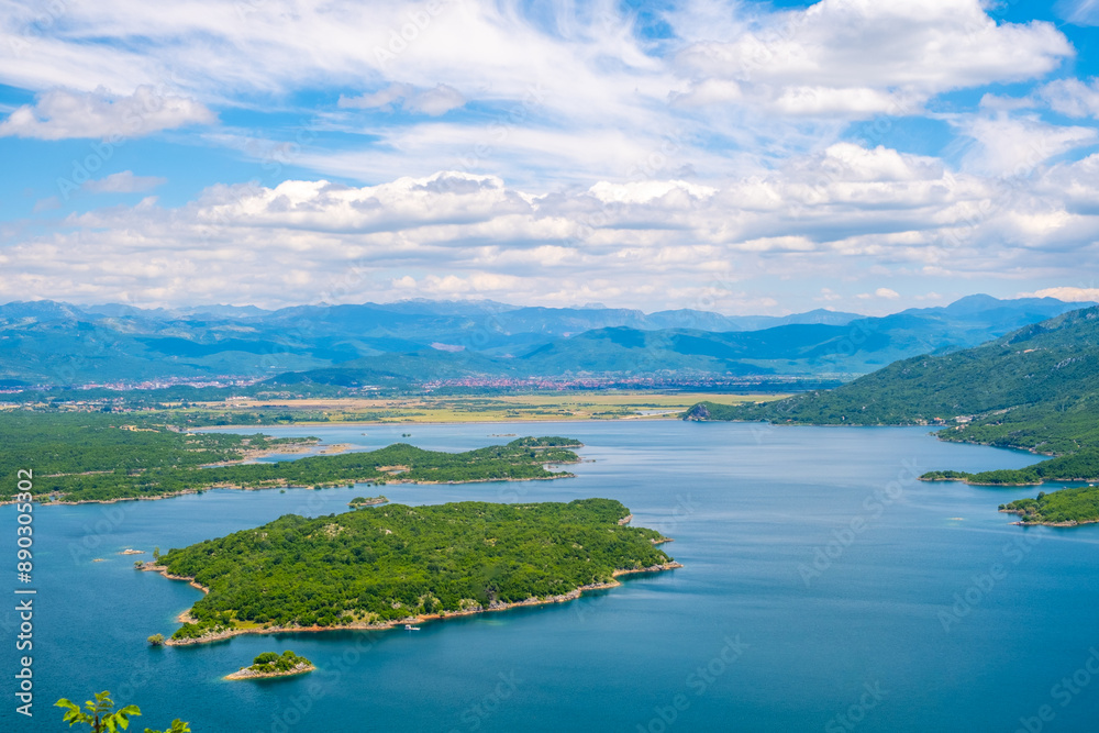 Aerial view of a lake, mountains and a small island Aerial view of a lake, mountains and a small island