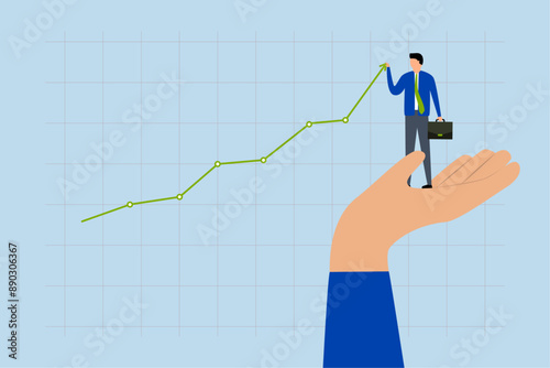 Drive sale increasing profit, businessman stands with  helping hand and pulls up rising graph.