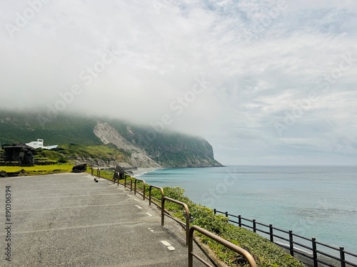 Long sandy beaches, towering white cliffs and plenty of waves, Niijima is surf paradise within easy reach of Tokyo JAPAN. photo