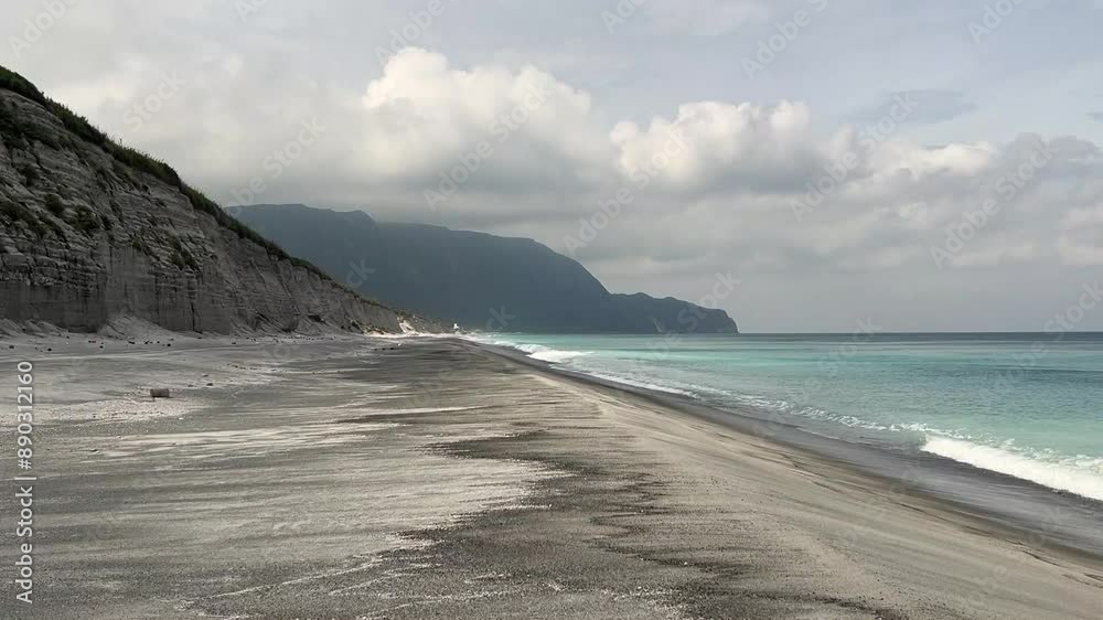 Habushiura Shore is a 6.5-kilometer-long white sand beach that rests under tall cliffs on the eastern side of Niijima Island in Tokyo JAPAN Habushiura Shore is a 6.5-kilometer-long white sand beach that rests under tall cliffs on the eastern side of Niijima Island in Tokyo JAPAN