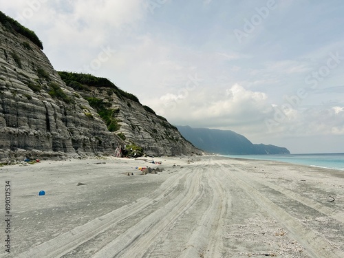 Habushiura Shore is a 6.5-kilometer-long white sand beach that rests under tall cliffs on the eastern side of Niijima Island in Tokyo JAPAN photo