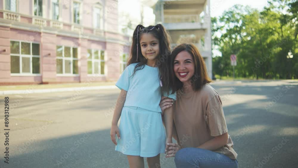 A heartwarming moment of happiness between a mother and daughter, sharing a strong bond in nature and city surroundings, reflecting their joyful and affectionate relationship A heartwarming moment of happiness between a mother and daughter, sharing a strong bond in nature and city surroundings, reflecting their joyful and affectionate relationship