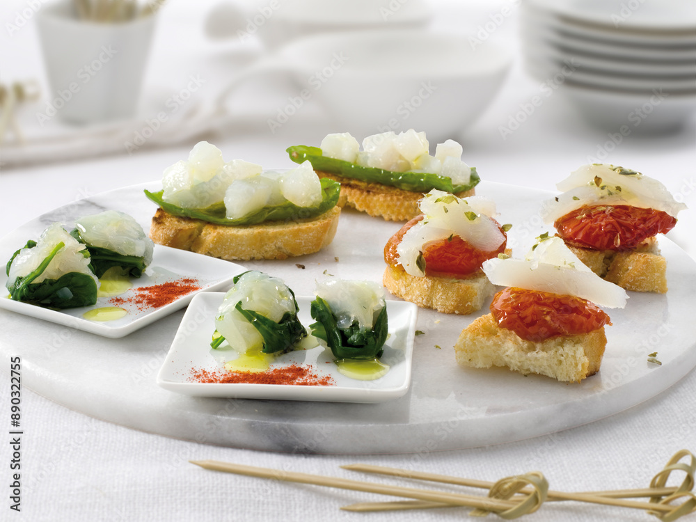 Canapés variados de bacalao, pimiento. Assorted canapés of cod and pepper. Canapés variados de bacalao, pimiento. Assorted canapés of cod and pepper.