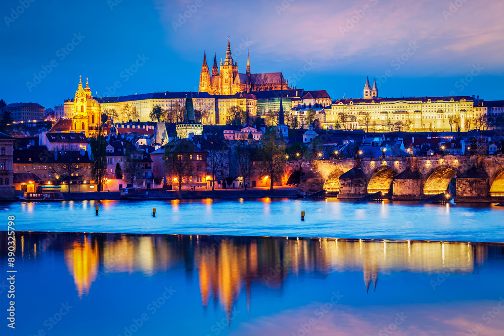 Obraz premium Travel Prague Europe concept background - view of Charles Bridge and Prague Castle in twilight. Prague, Czech Republic