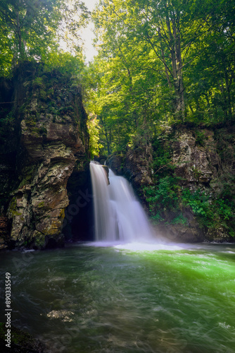 landscape with the Sipot Waterfall from Maramures Romania.