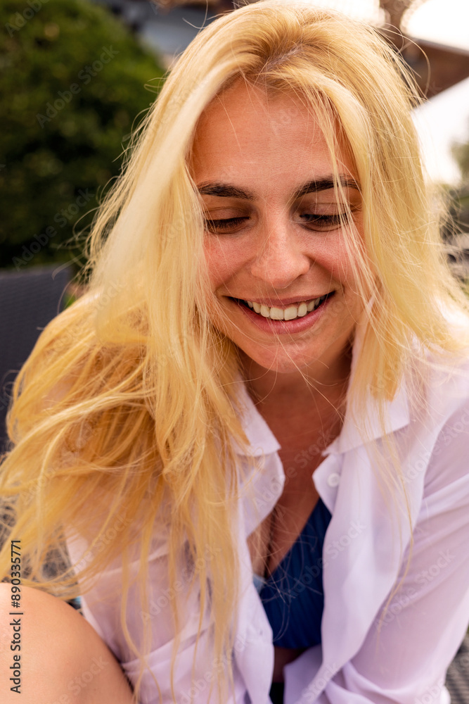 Blonde Woman in Blue Modern Swimsuit and Oversized White Shirt, Summer Vibes Lifestyle Close-Up Portrait Blonde Woman in Blue Modern Swimsuit and Oversized White Shirt, Summer Vibes Lifestyle Close-Up Portrait