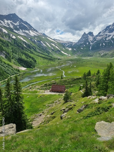 Courmayeur, Aosta Valley, Italy - Mont Blanc Massif. Combal lake and plateau, between Italy and France. In the background: Aiguille Noire de Peuterey, Aiguilles Blanches de Peuterey.
 photo