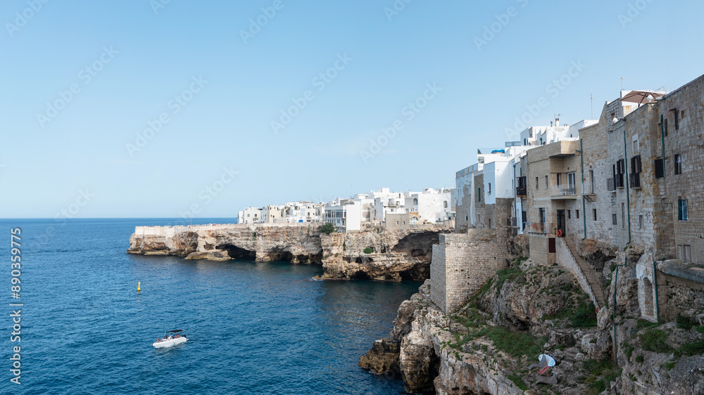 Polignano a mare, white and perched on a cliff overlooking a dream inlet. Polignano a mare, white and perched on a cliff overlooking a dream inlet.