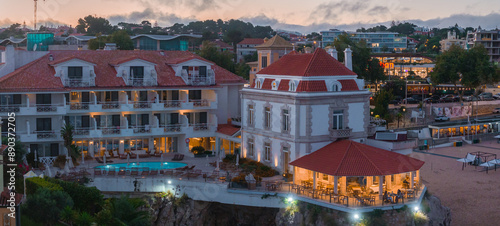 Aerial panoramic sunset view of Cascais. 30km west of Lisbon on the portuguese riveira, cascais, Portugal. Aerial view of Praia da Rainha and historic city centre of Cascais, Portugal photo