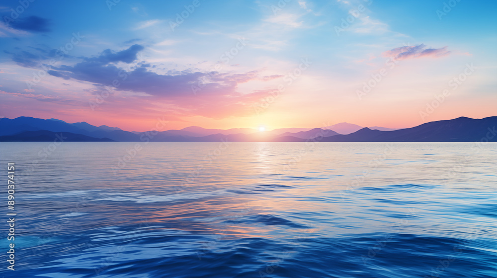 Fototapeta premium Serene Ocean Sunset with Mountain Silhouettes and Clear Sky