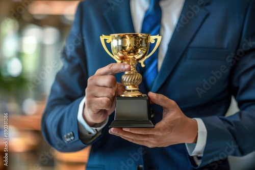 Businessman Holding Golden Trophy at Award Ceremony. Generative ai.