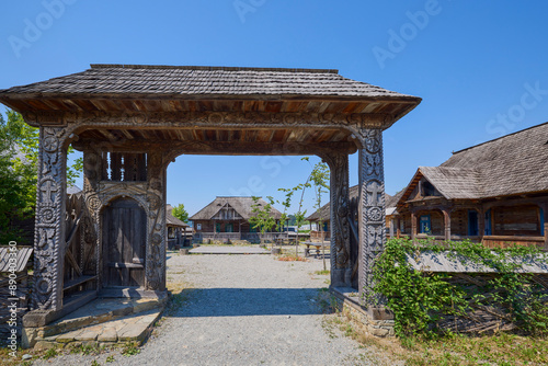 landscape with different traditional houses from Maramures, Romania, Houses built predominantly from wood.