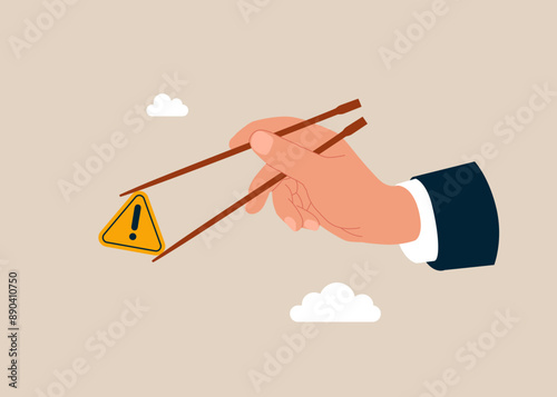 Gamma arm fingers hold chopsticks with exclamation attention sign. Investigate incident with exclamation attention sign. Incident management, identify risk. 