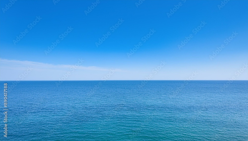 Tranquil view of calm sea against blue sky during summer Tranquil view of calm sea against blue sky during summer