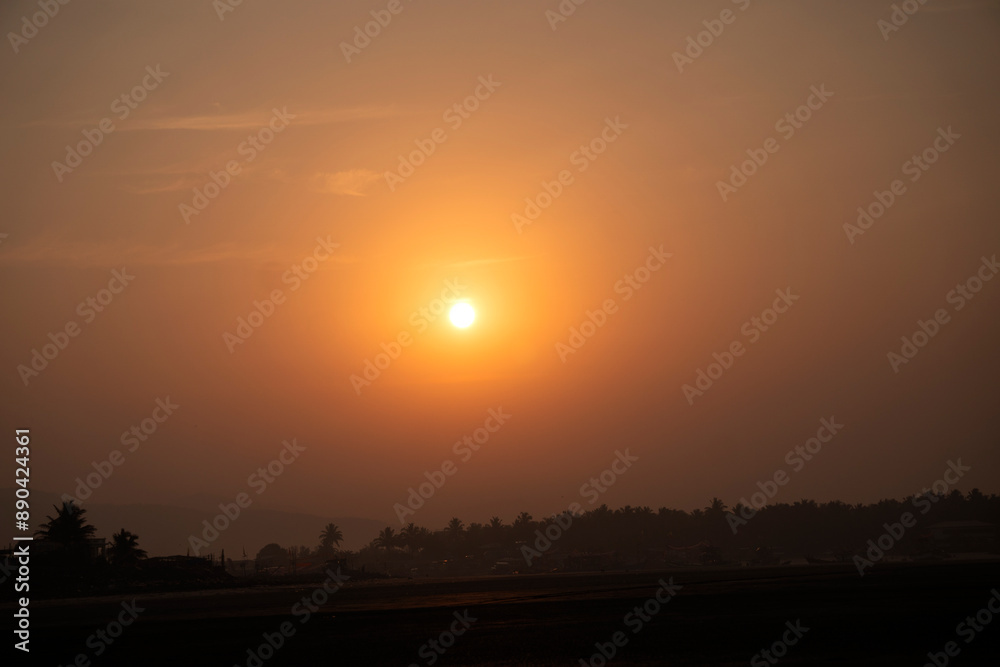 The setting sun at Murud beach. Murud is located 60 kms south of Alibag on the west coast of India. The setting sun at Murud beach. Murud is located 60 kms south of Alibag on the west coast of India.