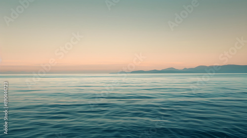 Tranquil Coastal Dawn with Expansive Horizon and Reflective Waters