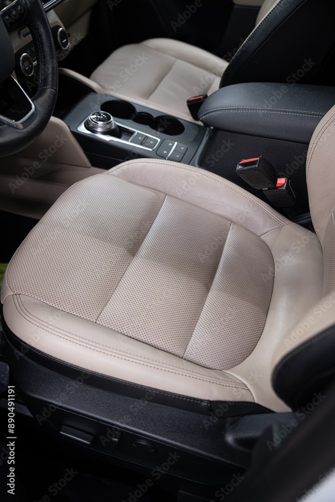 Before and after effect of cleaning leather upholstery in a car. Demonstrates professional auto detailing, highlighting transformation, cleanliness, and high-quality interior care