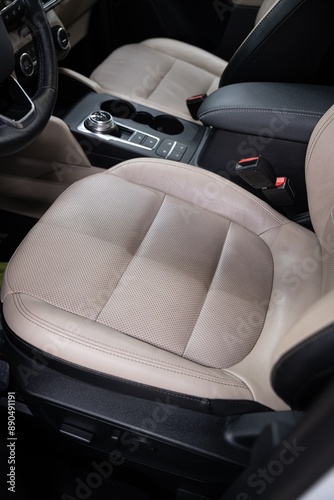 Before and after effect of cleaning leather upholstery in a car. Demonstrates professional auto detailing, highlighting transformation, cleanliness, and high-quality interior care