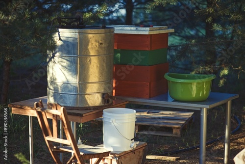 Rural and natural beekeeper, working to collect honey from hives